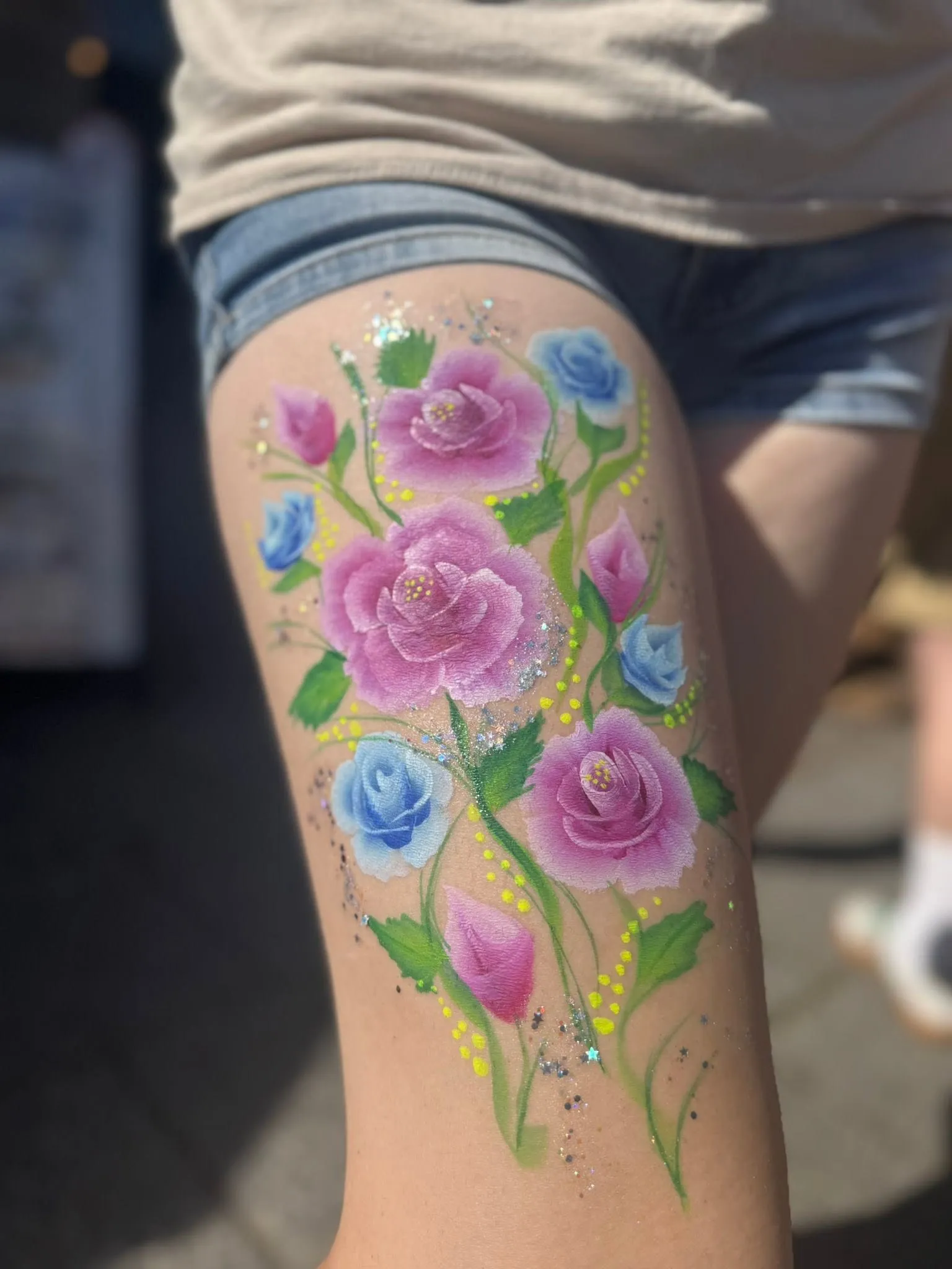 Painted flowers on an arm
