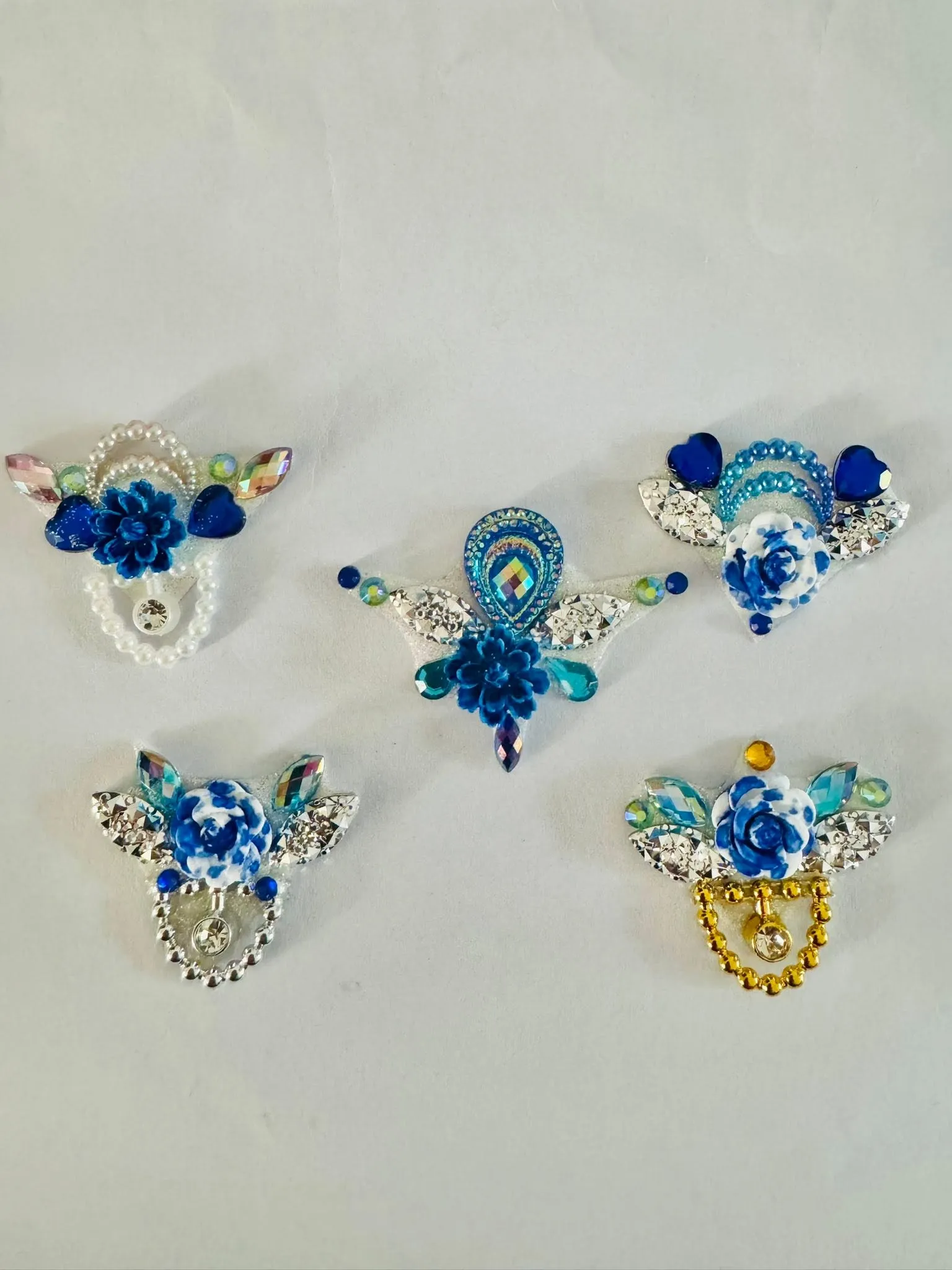 Five of Kerry's handmade gem clusters with pearls