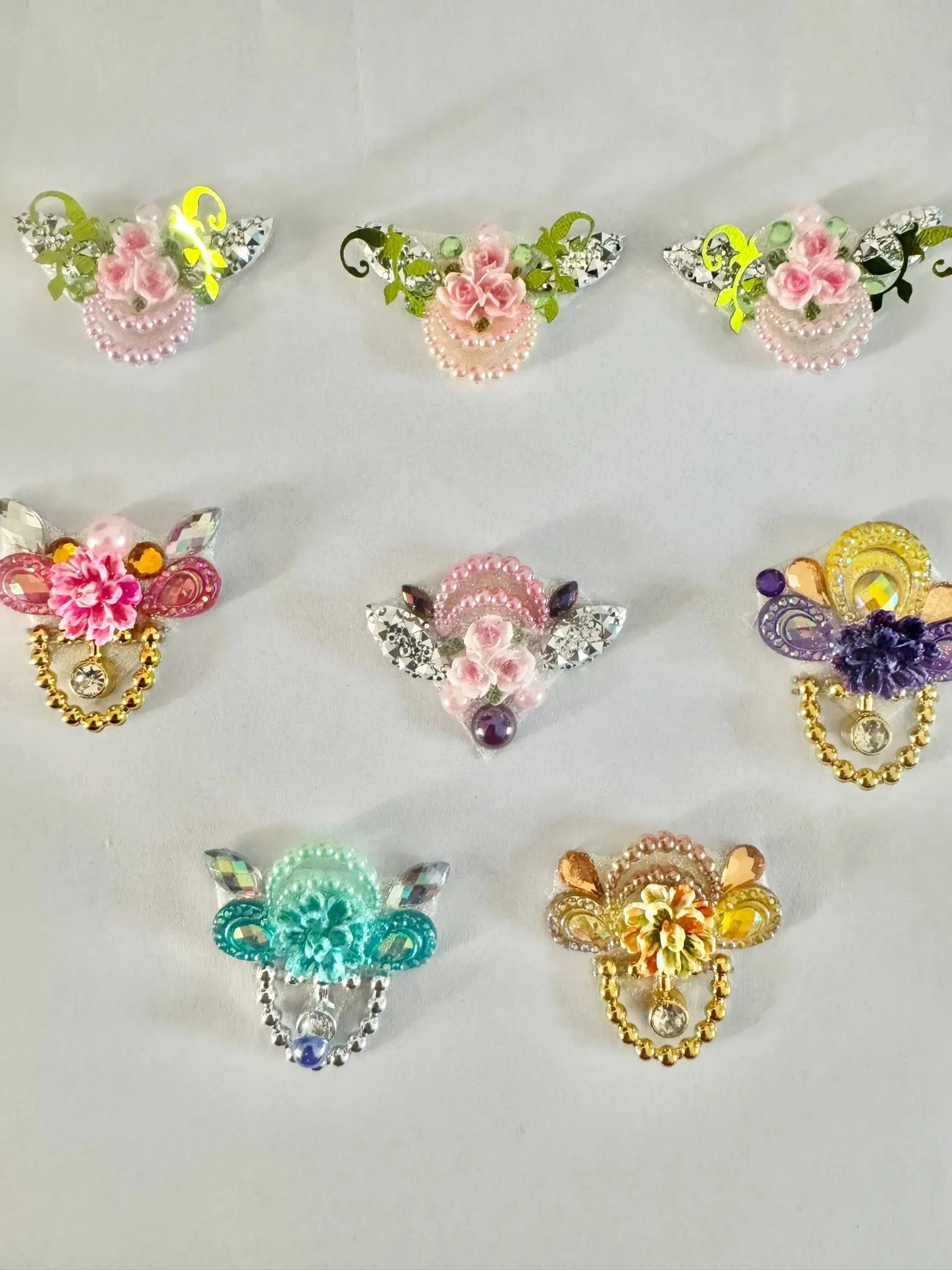 Handmade gem clusters in pastel colours on white