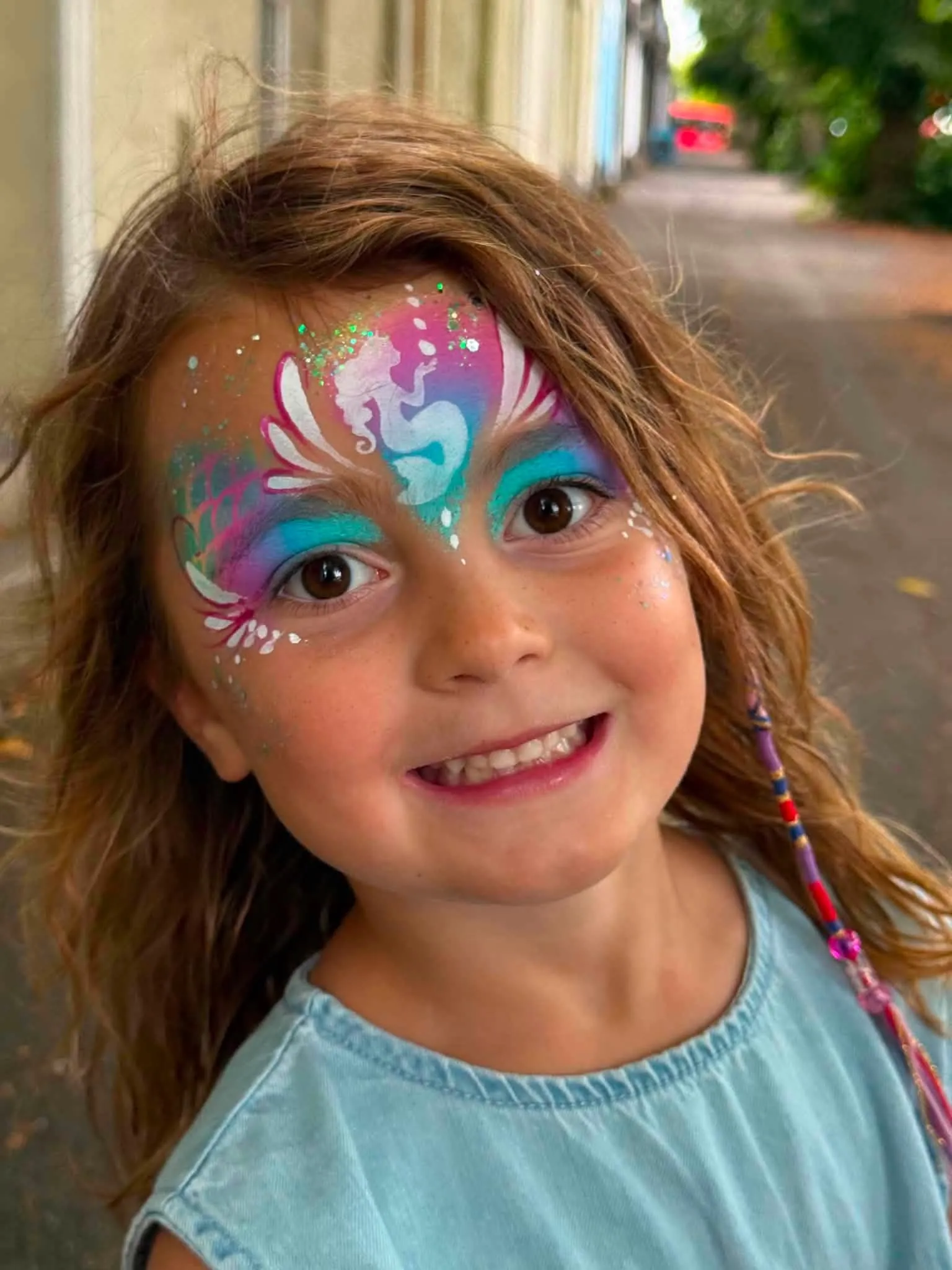 Girl with a pastel rainbow crown