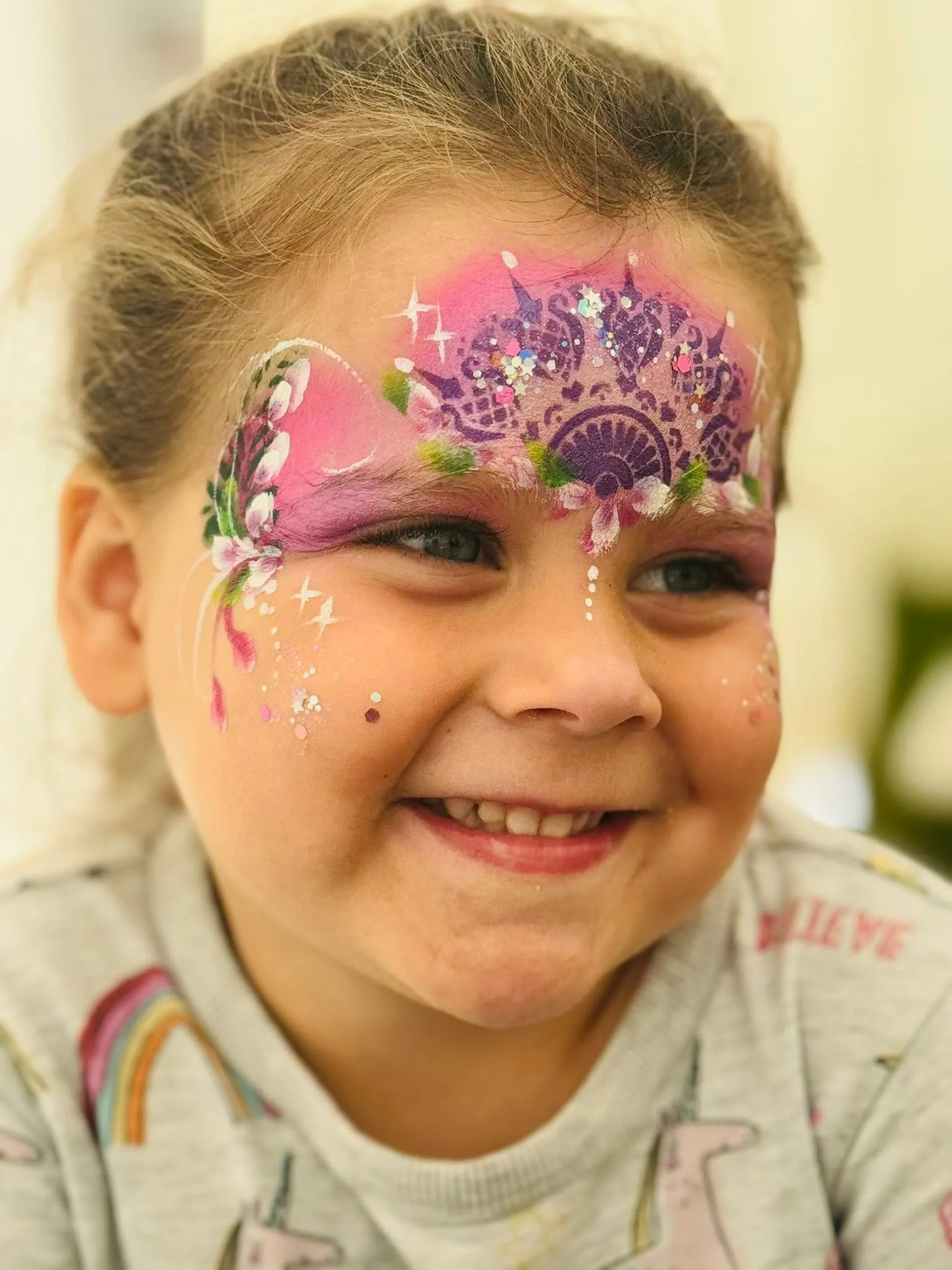 Girl with a pink butterfly crown